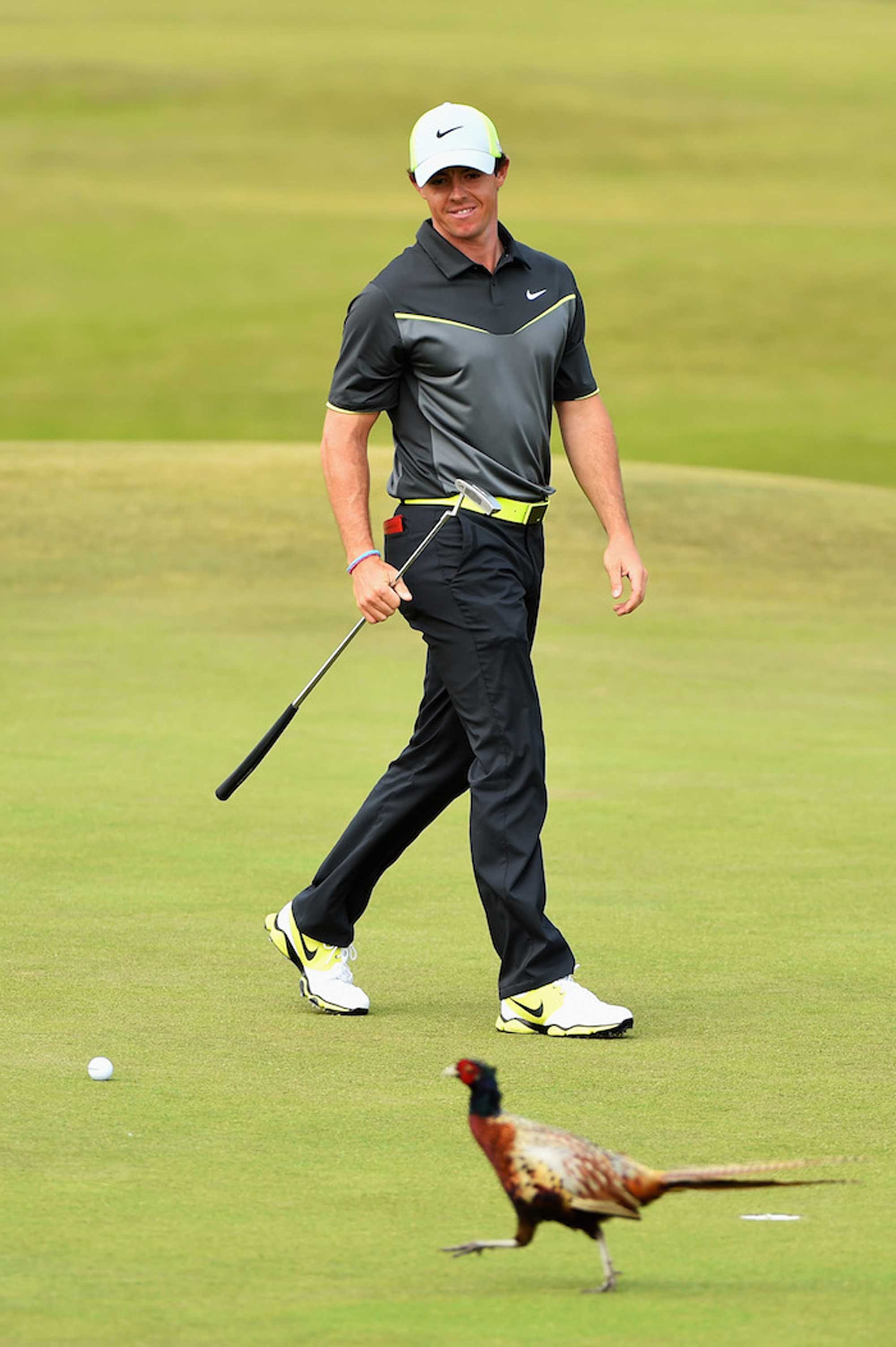 Green and pheasant land - Rory on his way to victory in 2014.